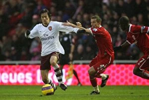 Images Dated 11th December 2007: Tomas Rosicky (Arsenal) and Gary O Neil (Middlesbrough)