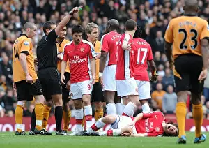 Arsenal V Wolverhampton Wanderers 2009-10 Prints: Tomas Rosicky (Arsenal) injured after a challenge from Wolves captain Carl Henry