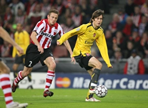 Images Dated 23rd February 2007: Tomas Rosicky (Arsenal) Jan Kromkamp (PSV)