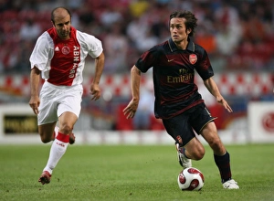 Ajax v Arsenal 2007-8 Gallery: Tomas Rosicky (Arsenal) Kennedy Bakircioglu (Ajax)