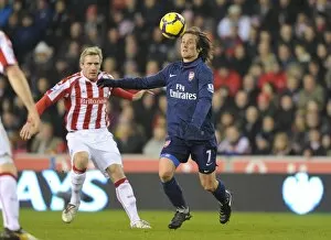 Images Dated 27th February 2010: Tomas Rosicky (Arsenal) Liam Lawrence (Stoke). Stoke City 1: 3 Arsenal, Barclays Premier League