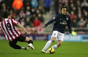 Images Dated 21st November 2009: Tomas Rosicky (Arsenal) Lorik Cana (Sunderland). Sunderland 1: 0 Arsenal