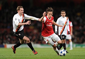 Arsenal v Shaktar Donetsk 2010 - 11 Collection: Tomas Rosicky (Arsenal) Luiz Adriano (Shakhtar). Arsenal 5: 1 Shakhtar Donetsk