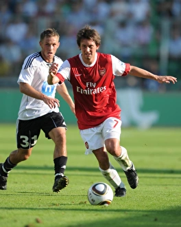 Legia Warsaw v Arsenal 2010-11 Gallery: Tomas Rosicky (Arsenal) Maciej Rybus (Leiga). Legia Warsaw 5: 6 Arsenal