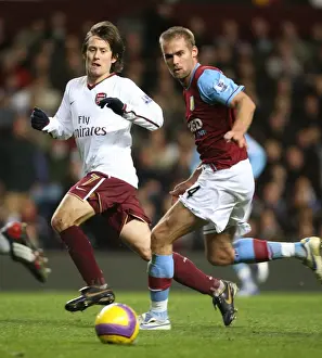 Tomas Rosicky (Arsenal) Olof Mellberg (Aston Villa)