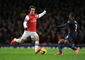 Images Dated 12th February 2014: Tomas Rosicky (Arsenal) Patrice Evra (Man Utd). Arsenal 0: 0 Manchester United. Barclays