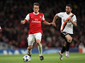 Arsenal v Shaktar Donetsk 2010 - 11 Collection: Tomas Rosicky (Arsenal) Razvan Rat (Shaktar). Arsenal 5: 1 Shaktar Donetsk