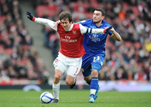Images Dated 8th January 2011: Tomas Rosicky (Arsenal) Robert Snodgrass (Leeds). Arsenal 1: 1 Leeds United