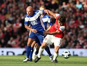Images Dated 16th October 2010: Tomas Rosicky (Arsenal) Stephen Carr (Birmingham). Arsenal 2: 1 Birmingham City