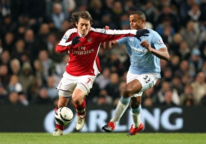 Manchester City v Arsenal - Carling Cup 2009-10 Collection: Tomas Rosicky (Arsenal) Vincent Kompany (Man City). Manchester City 3: 0 Arsenal