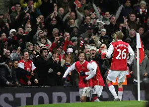 Tomas Rosicky celebrates scoring Arsenals 2nd goal with Bacary Sagna and the fans