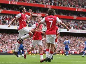 Tomas Rosicky celebrates scoring Arsenals 3rd goal with Cesc Fabregas and Alex Hleb