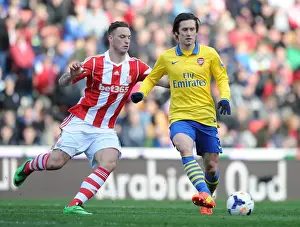 Stoke City V Arsenal 2013-14 Prints: Tomas Rosicky Outmaneuvers Marko Arnautovic: A Pivotal Moment in Stoke vs