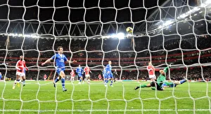 Tomas Rosicky shoots past Everton goalkeeper Tim Howard to score the 2nd Arsenal goal Tomas Rosicky shoots past Everton goalkeeper Tim Howard to score the 2nd Arsenal goal