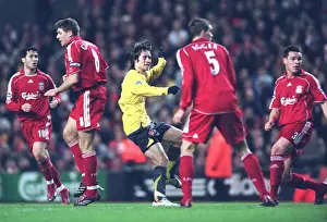 Tomas Rosicky shoots past Liverpool goalkeeper Jerzy Dudek score the 2nd Arsenal goal