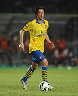 Indonesia Dream Team v Arsenal 2013-14 Collection: Tomas Rosicky's Unforgettable Performance: Arsenal vs Indonesia Dream Team (2013-14)