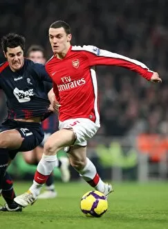 Arsenal v Bolton 2009-10 Collection: Tomas Vermaelen (Arsenal) Tamir Cohen (Bolton). Arsenal 4: 2 Bolton Wanderers