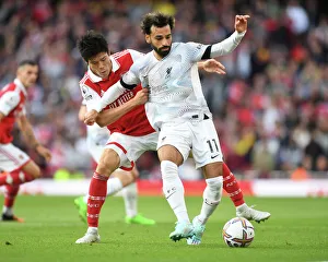 Tomiyasu Stifles Salah: Arsenal vs. Liverpool's Intense Battle (2022-23)
