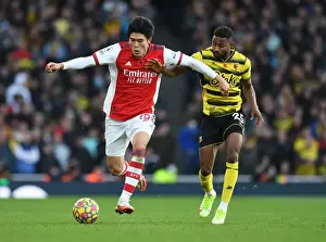 Arsenal V Watford 2021-22 Prints: Tomiyasu vs. Dennis: A Premier League Showdown at Emirates Stadium