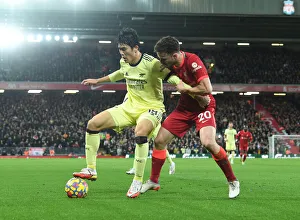 Tomiyasu vs. Jota: A Premier League Battle at Anfield