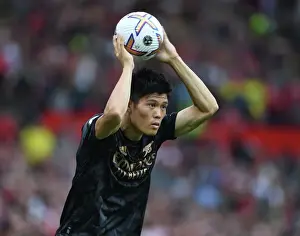 Manchester United V Arsenal 2022-23 Prints: Tomiyasu vs Manchester United: Arsenal's Defender Stands Firm in Premier League Showdown (2022-23)