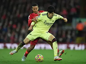 Tomiyasu vs. Thiago: A Premier League Battle at Anfield