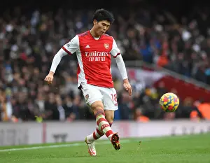 Arsenal V Newcastle United 2021-22 Prints: Tomiyasu's Standout Display: Arsenal's Victory over Newcastle United in Premier League 2021-22