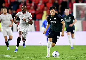Sevilla V Arsenal 2023-24 Prints: Tomiyasu's Thrilling Display: Arsenal's Win Against Sevilla in the 2023-24 Champions League (Group B)
