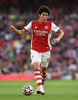 Arsenal V Tottenham Hotspur 2021-22 Prints: Tomiyasu's Unyielding Performance: Arsenal vs. Tottenham Premier League Clash