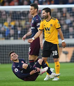 Torreira in Pain: Wolverhampton's Moutinho Inflicts Injury on Arsenal Midfielder