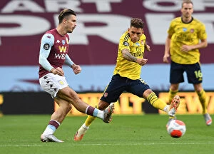 Images Dated 22nd July 2020: Torreira Tackles Grealish: Aston Villa vs. Arsenal, Premier League 2019-2020