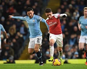 Manchester City v Arsenal 2018-19 Collection: Torreira Tackles Silva: Manchester City vs. Arsenal, Premier League 2018-19