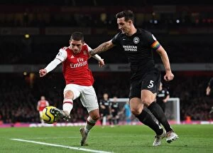Images Dated 6th December 2019: Torreira vs Dunk: Intense Battle at Emirates Stadium - Arsenal vs Brighton & Hove Albion
