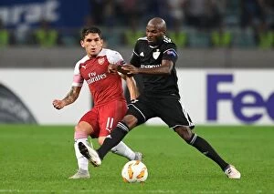 Images Dated 4th October 2018: Torreira vs Emeqara: Clash in the Europa League between Qarabag and Arsenal