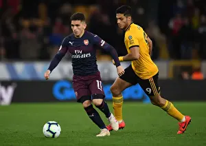 Wolverhampton Wanderers V Arsenal 2018-19 Prints: Torreira vs. Jimenez: Intense Battle in Wolverhampton Wanderers vs