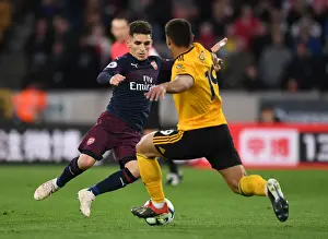 Wolverhampton Wanderers V Arsenal 2018-19 Prints: Torreira vs Jonny: Intense Clash Between Wolverhampton and Arsenal in Premier League