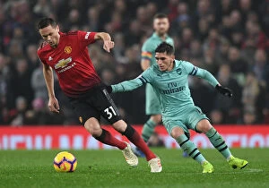 Manchester United v Arsenal 2018-19 Collection: Torreira vs. Matic: Intense Battle in Manchester United vs. Arsenal FC Premier League Clash