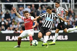 Newcastle United V Arsenal 2018-19 Prints: Torreira vs Muto: Intense Battle in Newcastle United vs Arsenal FC Premier League Clash