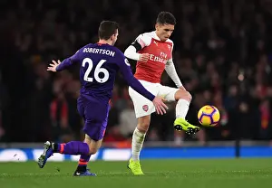 Torreira vs Robertson: Intense Battle in Arsenal vs Liverpool Premier League Clash