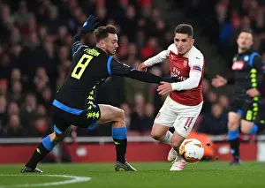 Arsenal V SSC Napoli 2018-19 Prints: Torreira vs. Ruiz: A Midfield Showdown in Arsenal's Europa League Battle against Napoli