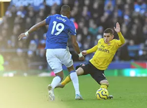 Everton v Arsenal 2019-20 Collection: Torreira vs Sidibe: Intense Battle in Everton vs Arsenal Premier League Clash
