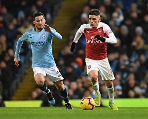 Manchester City v Arsenal 2018-19 Collection: Torreira vs Silva: Intense Tackle in the Premier League Showdown between Manchester City