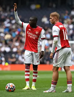 Tottenham Hotspur V Arsenal - The Mind Series 2021-22 Prints: Tottenham vs Arsenal: The Mind Series Showdown - Pepe and Smith Rowe in Action