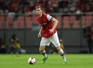 Nagoya Grampus V Arsenal 2013-14 Prints: TOYOTA, JAPAN - JULY 22: Per Mertesacker of Arsenal FC during the pre-season Asian Tour friendly match between Nagoya