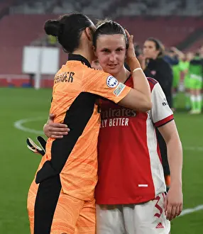 Arsenal Women V VfL Wolfsburg 2021-22 Prints: Triumphant Embrace: Arsenal Women's UEFA Champions League Victory