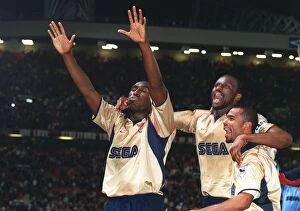 Triumphant Threesome: Arsenal's Vieira, Cole, and Campbell Celebrate Championship Victory over Manchester United