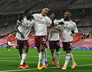 Triumphant Threesome: Aubameyang, Partey, and Lacazette's Goal Celebration - Manchester United vs Arsenal (2020-21)