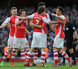Arsenal Everton 2014-15 Prints: Triumphant Threesome: Rosicky, Ozil, and Cazorla Celebrate Arsenal's 2-0 Over Everton