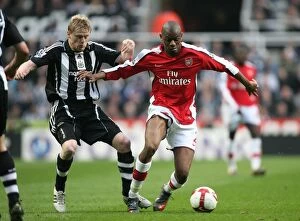 Newcastle United v Arsenal 2008-9 Collection: Triumphant Trios: Abou Diaby and Damien Duff Clash in Arsenal's 3-1 Victory over Newcastle United