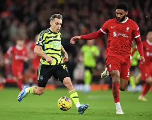 Liverpool V Arsenal 2023-24 Prints: Trossard vs. Gomez: A Riveting Battle at Anfield - Premier League 2023-24